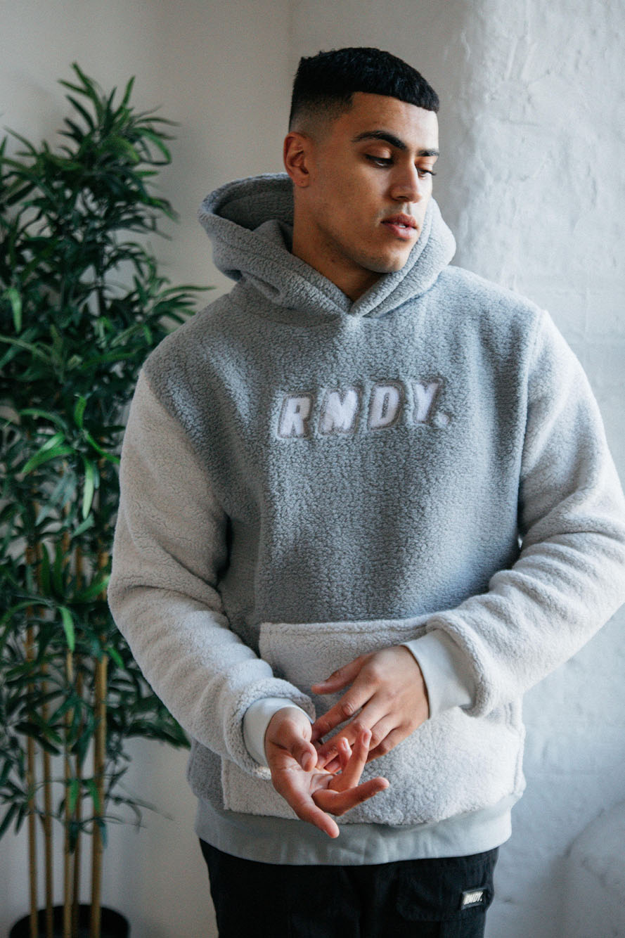 <transcy>Grauer RMDY. Kapuzenpullover aus Teddyfleece</transcy>