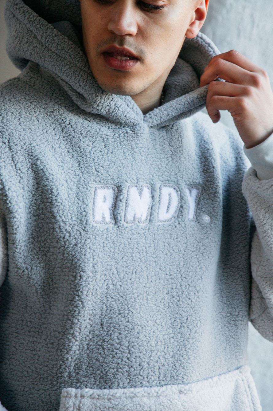 <transcy>Grauer RMDY. Kapuzenpullover aus Teddyfleece</transcy>
