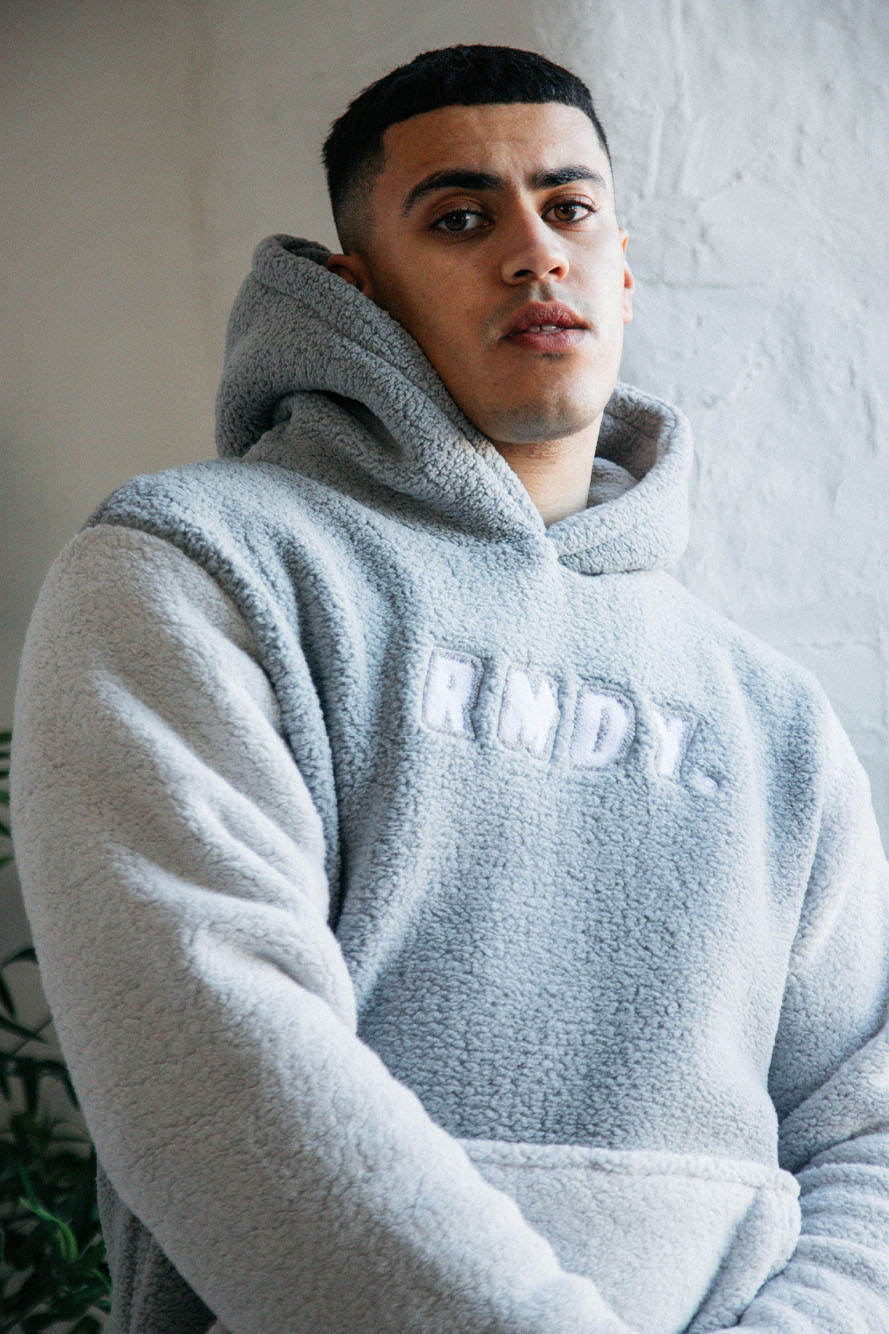 <transcy>Grauer RMDY. Kapuzenpullover aus Teddyfleece</transcy>
