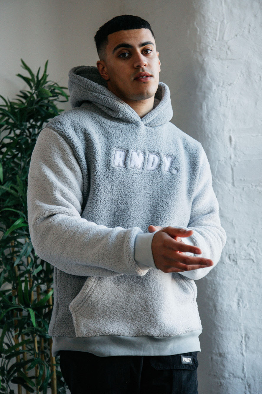 <transcy>Grauer RMDY. Kapuzenpullover aus Teddyfleece</transcy>