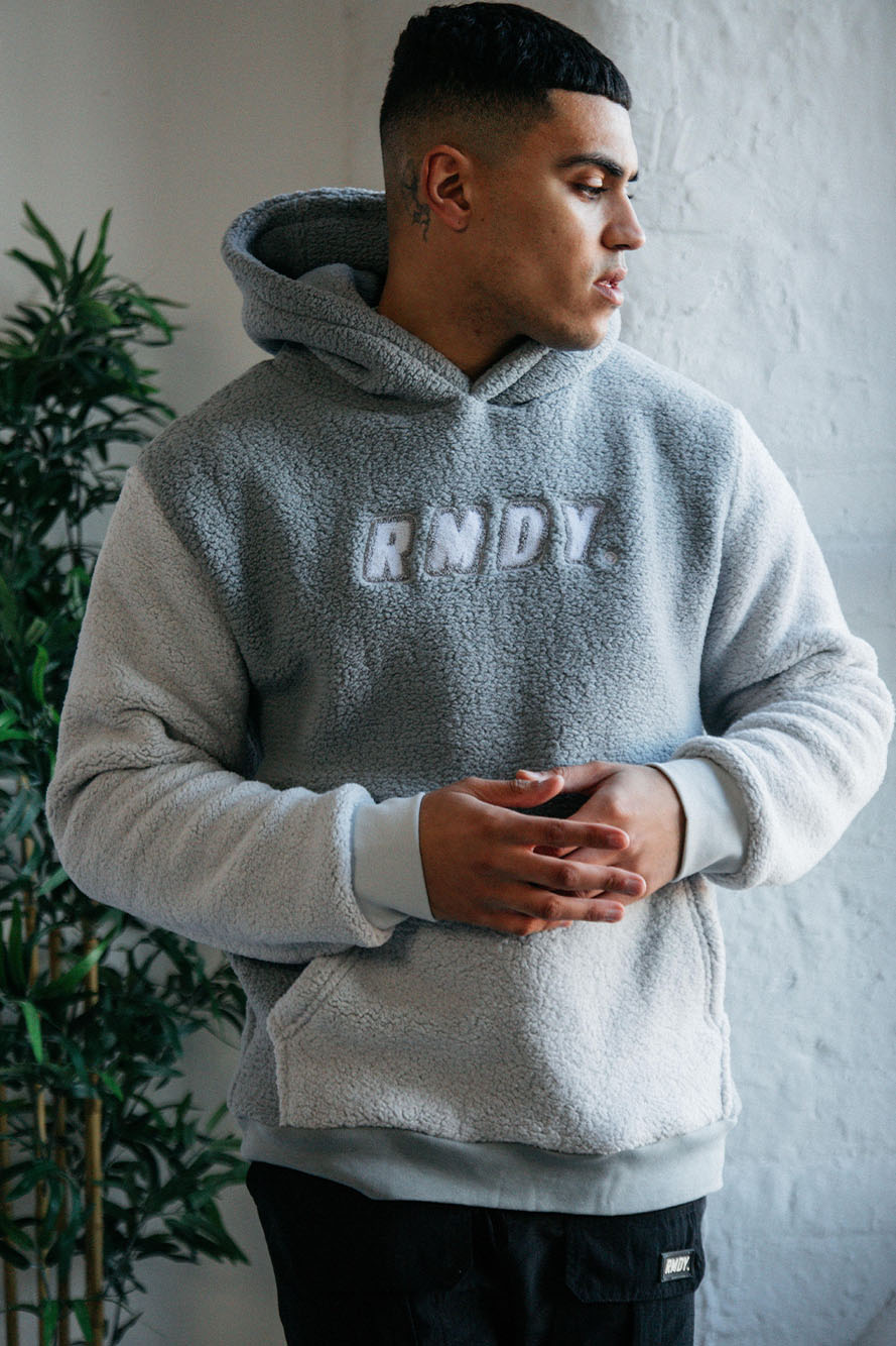 <transcy>Grauer RMDY. Kapuzenpullover aus Teddyfleece</transcy>