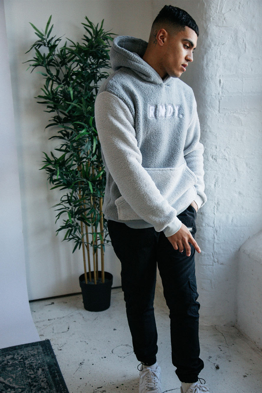 <transcy>Grauer RMDY. Kapuzenpullover aus Teddyfleece</transcy>